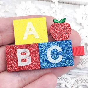 Nouveauté 2026 : Accessoires de fête en tissu pour enfants, incluant des pinces à cheveux barrettes mignonnes et colorées, motifs crayon, livre, terre, ABC, dessin animé, princesse et à clipser - Product Image 3