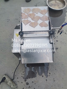 ماكينة أوتوماتيكية لجلود الأسماك على سطح الطاولة من سمك البلطي - Product Image 3