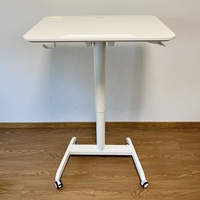 Bureau debout mobile moderne à hauteur réglable pneumatique avec chariot, plateau pliable peu encombrant et cadre en aluminium pour bureau