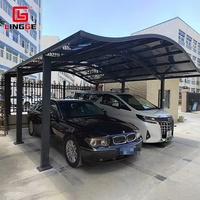 Abri de voiture double moderne en polycarbonate, résistant au vent et à l'eau, avec protection UV et structure en aluminium