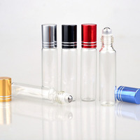 Flacon de parfum miniature rond en verre transparent de 10 ml, pas cher, personnalisé, pour huile essentielle, gloss à lèvres, avec bille roulante et bouchon métallique