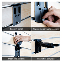Supports de guitare pliables muraux réglables en gros du fabricant avec loquet à activation par gravité, supports durables en métal et plastique
