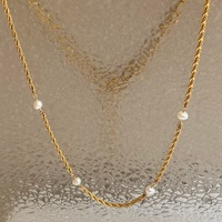 Mode rétro 18k chaîne en or électrolytique titane acier perle d'eau douce chaîne torsadée collier