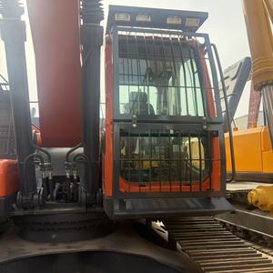 รถขุด Doosan DX300LC-9C สีส้ม พร้อมป้ายเตือนและรางตีนตะขาบ - Product Image 6