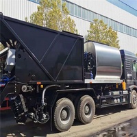 Camión de reparación de baches de asfalto de 12000 litros Sino Howo con componente de núcleo de motor de alta calidad