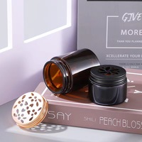 Pot diffuseur en verre ambré avec couvercle perforé en métal pour perles et baumes