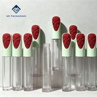 Tube de brillant à lèvres vide unique en gros, flacon cosmétique transparent pour huile à lèvres avec capuchon vert menthe et décor rose rouge en relief 3D