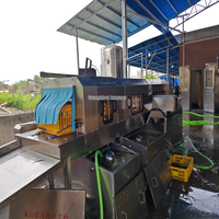 Machine de lavage automatique de cages à poulets SUS304 à haute pression et eau chaude 80°C pour l'industrie de la transformation de la volaille