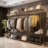 Présentoir de vêtements haut de gamme au détail à vendre Présentoir mural pour vêtements en jean Étagère pour magasin