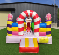 Structure gonflable personnalisée en forme de bonbon pour enfants, idéale pour les événements extérieurs, les parcs d'attractions et les locations commerciales.