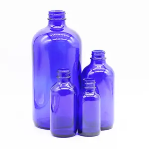 Kozmetik sıvı ambalaj için yüksek kaliteli cam şişe 50 ml 100ml 200ml mavi Boston şişe cam pompa şişesi cilt bakımı için