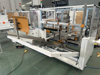 Machine de formage automatique de boîtes en carton de livraison pour le commerce électronique machine de déballage vertical de scellage de fond automatique de ruban à grande vitesse