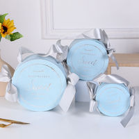 Boîte à bonbons ronde en chocolat avec logo personnalisé ODM OEM, conception gratuite, boîte estampée à chaud avec poignée