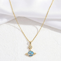 Collier en acier inoxydable plaqué or 18 carats avec pendentif planète Saturne, breloque étoile en zircone, chaîne à maillons inspirée de la galaxie pour femme