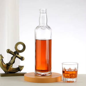 Petites bouteilles rondes en verre flint pour boissons alcoolisées et jus, avec logo personnalisé et boîte - Product Image 1