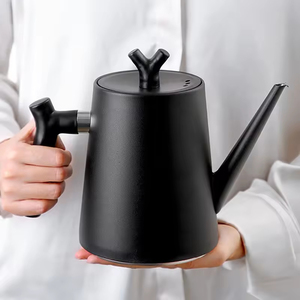 Hervidor de agua eléctrico en miniatura que ofrece un calentamiento eficiente para bebidas. - Product Image 3