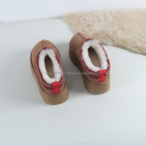 Vente directe de <span class=keywords><strong>pantoufles</strong></span> pour femmes de haute qualité, style Uggs, doublure en <span class=keywords><strong>peau</strong></span> de <span class=keywords><strong>mouton</strong></span> douce, pour la chambre, semelles en caoutchouc EVA - Product Image 2