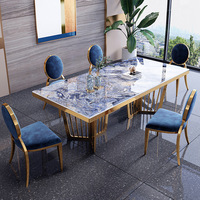 Table à manger rectangulaire en acier inoxydable de style italien avec plateau en pierre frittée, combinaison de chaises, mobilier de maison postmoderne de Hong Kong