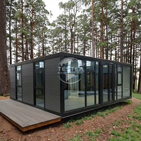Maison moderne à cadre de conteneur en forme d'aile de biplan Panneau sandwich de vie mobile Petites maisons respirantes avec cuisine et salle de bain