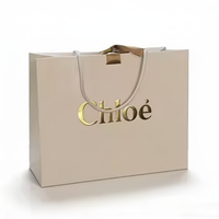 Sac cadeau en papier couché personnalisé avec matériaux recyclés, impression UV, poignée longue, emballage de luxe