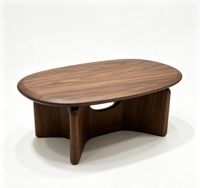 Table basse ovale en noyer de style mid-century, base sculpturale à découpe cintrée, table centrale minimaliste en bois massif pour salon