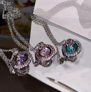 <span class=keywords><strong>Collana</strong></span> con Catene e Ciondolo a Forma di <span class=keywords><strong>Saturno</strong></span> e Stella alla Moda all'Ingrosso per Donna e Uomo, Girocollo in Metallo per Donna, Orecchini e Gioielli - Product Image 1