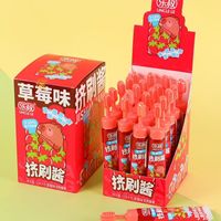 Vente en gros de dentifrice liquide en tube à presser et à brosser, bonbons à la confiture, étiquette privée personnalisée, dentifrice en tube, bonbons au sucre, jouets pour enfants