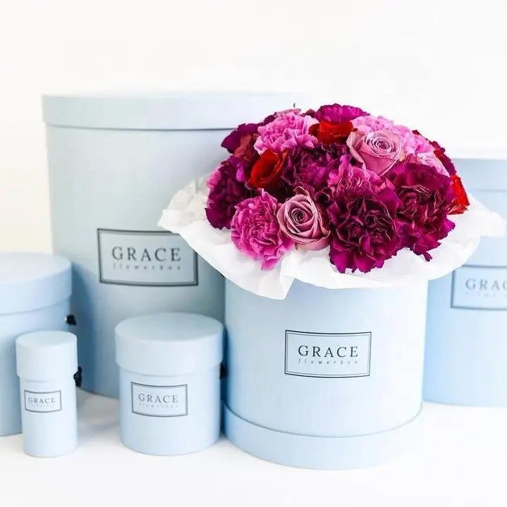 Boîtes à chapeau en papier cadeau fleurs rondes personnalisées pour l'emballage bouquet roses