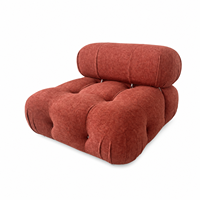 Fauteuil lounge modulaire en velours tufté, canapé simple sans accoudoirs, fauteuil d'appoint terracotta, design italien à profil bas pour salon et hôtel