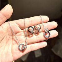 Vente en gros de parures de bijoux pour femmes en acier inoxydable 316L personnalisées avec des chiffres romains, plaquées or 18 carats PVD et serties de zirconias