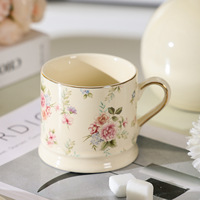 Mug Kopi Porselen Berpinggiran Emas Motif Bunga Cantik Gaya Eropa Kapasitas 290ml Untuk Penggunaan di Rumah