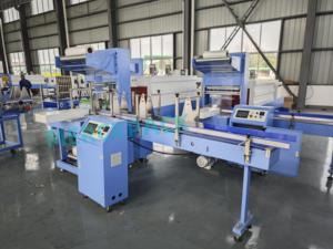 Máquina Automática de Envasado y Empaquetado por Termocontracción de Película Plástica de PE PET, Línea Completa de Producción de Botellas de Agua y Refrescos - Product Image 2