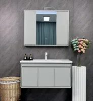 Meuble-lavabo moderne en MDF laqué mélaminé sur mesure avec vasque en céramique et miroir LED résistant à l'eau pour hôtel et appartement