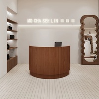 Bureau de réception incurvé cannelé de luxe et durable avec comptoir de réception LED demi-cercle, design personnalisable