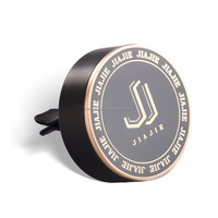 Diffuseur de voiture d'aromathérapie d'huiles essentielles en alliage de logo personnalisé Ornements de parfum de sortie automatique Clip de parfum de voiture