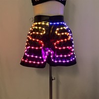 Pantalon en cuir LED clignotant, tenue de soirée lumineuse, short en cuir pour performance scénique, vêtements lumineux pour club, rave et événements musicaux