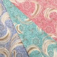Tissu satiné en polyester imprimé doré de qualité fiable fabriqué à Shaoxing pour robe