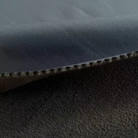 100% Poliéster imitación memoria T400 tejido elástico unido con forro polar negro para chaqueta Softshell