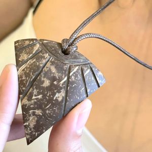 Ethnic Style Recycled Coconut Shell Necklace Handcrafted Ethnic Jewelry Collection Coconut Shell Pendant Originating Indonesia - Product Image 1