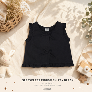 รายละเอียดของริบบิ้นสีดำเพิ่มความโดดเด่นอย่างน่ารักให้กับเสื้อเชิ้ตผ้าฝ้ายแบบไม่มีแขนเสื้อ ซึ่งเป็นตัวเลือกที่ง่ายดายสำหรับการสวมใส่ในชีวิตประจำวันอย่างมีสไตล์ - Product Image 4