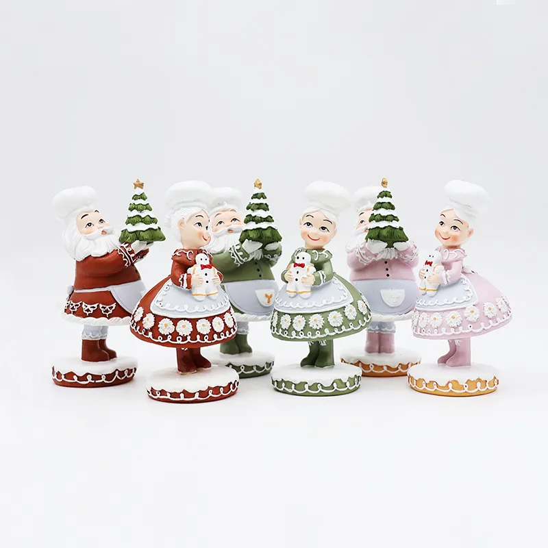 Figuras de decoración de Mesa para el hogar de Navidad al por mayor, estatuas personalizadas multicolor, artesanía de resina, figuritas de pareja de santa, adorno