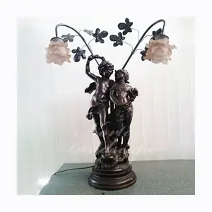 Wholesale custom home decor metal crafts carved brass bronze children statue table lamp prices