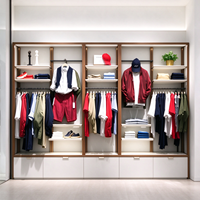 Meubles de magasin de vêtements : Armoire murale à cadre en bois, rail de suspension, table îlot de présentation, CE ETL, vente en gros pour boutiques et détaillants