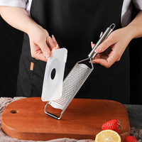 Vente en gros d'articles de cuisine multifonctionnels de style créatif de qualité supérieure Gadgets de cuisine Trancheuse à légumes Râpe à fromage