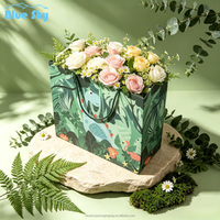 Sacs shopping en papier personnalisés OEM/ODM avec nœud papillon pour vêtements, bijoux, cadeaux, emballage en papier, sac fourre-tout, vente en gros