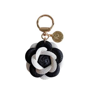 Leather Camellia Flower Keychain - Cute Car <b>Key</b> <b>Ring</b>, Backpack Charm - Product Image 1