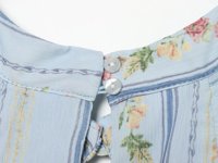 Nouvelle robe mini décontractée pour femme 2026, imprimé floral, style rétro chic, sans manches, coupe ajustée.