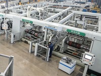 Machine de fabrication de pneus pour voitures particulières radiales