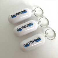 Porte-clés flottant créatif en forme de capsule, couleur unie, portable, avec logo OEM pour activités aquatiques en extérieur