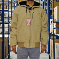 Veste matelassée à capuche pour homme, de qualité supérieure, fabriquée en toile épaisse coupe-vent de 12 oz, avec logo personnalisé, pour le travail en hiver, directement de l'usine